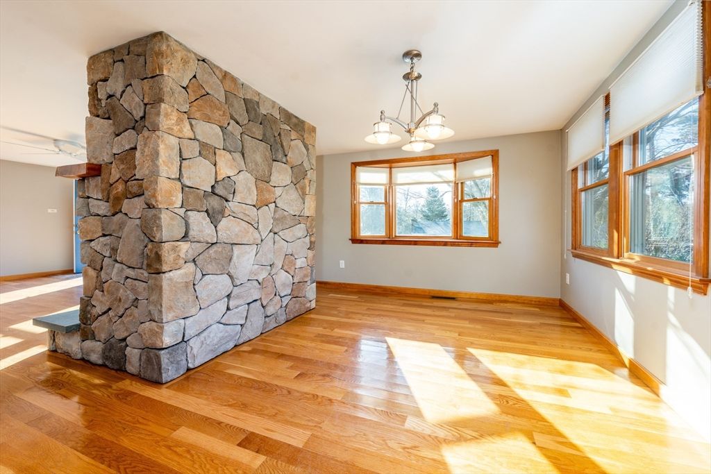 Empty room, Fireplace, Interior, Pendant Lights, Stone Walls, Wood Texture Flooring