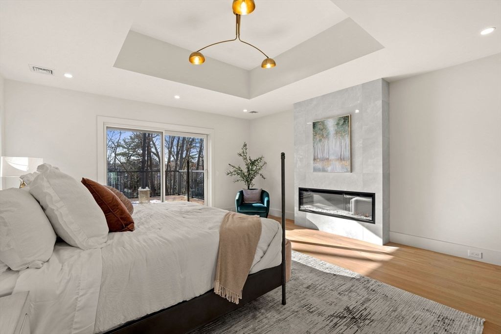 Bedroom, Fireplace, Interior, Pendant Lights, Recessed Lighting, Wood Texture Flooring