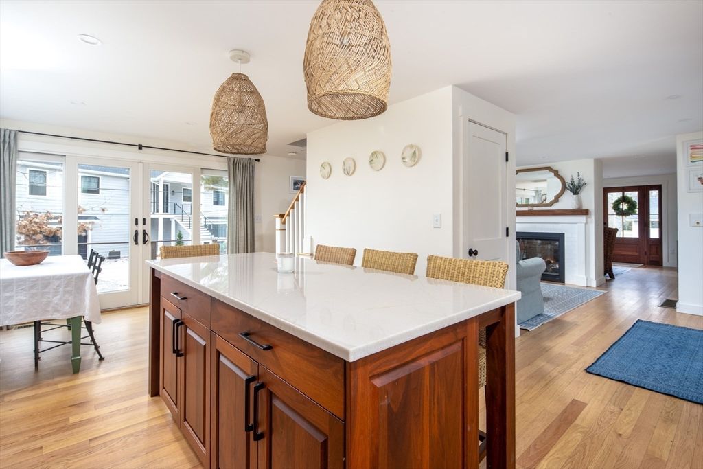 Dining room, Fireplace, Interior, Kitchen, Recessed Lighting, Wood Texture Flooring