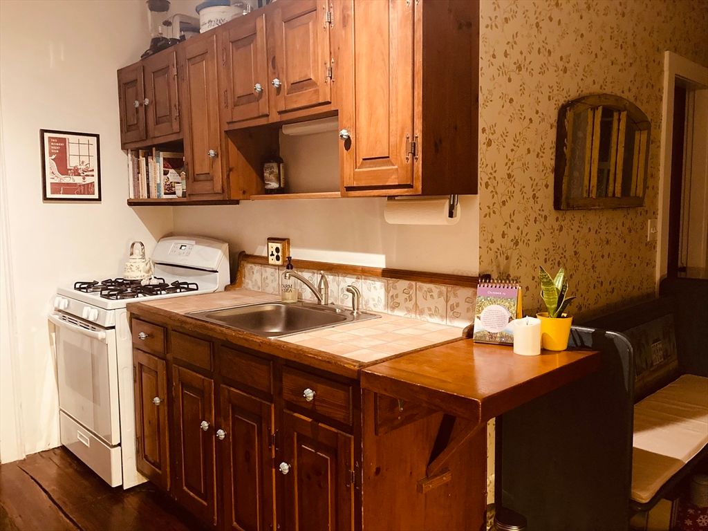 Interior, Kitchen, Tile Countertops, Wood Texture Flooring