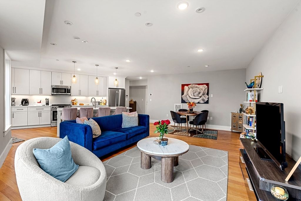 Dining room, Interior, Kitchen, Living room, Pendant Lights, Recessed Lighting, Stainless Steel Appliances, Wood Texture Flooring