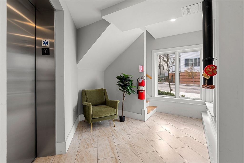 Elevator, Interior, Recessed Lighting, Wood Texture Flooring