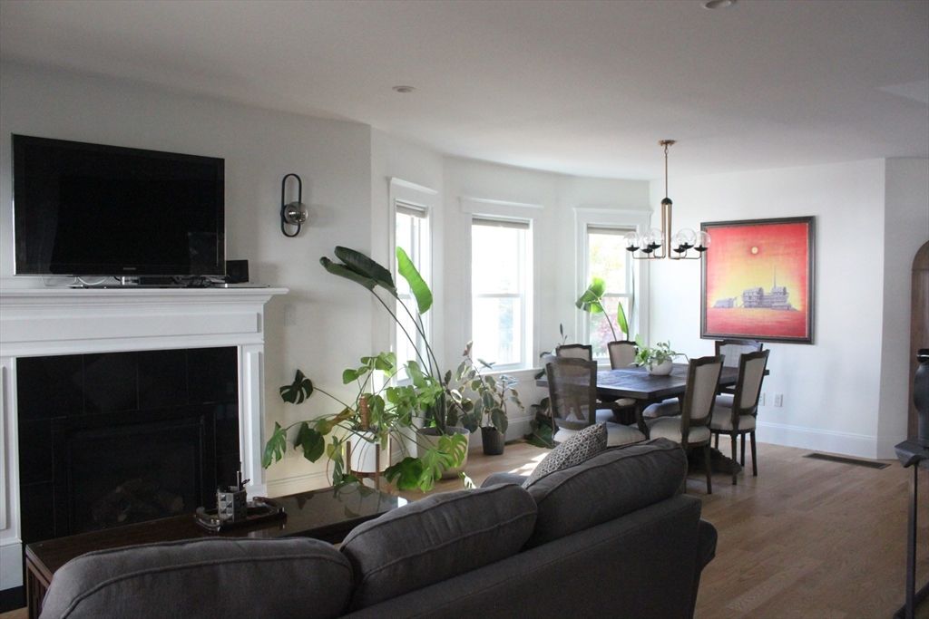 Dining room, Fireplace, Interior, Living room, Pendant Lights, Wood Texture Flooring