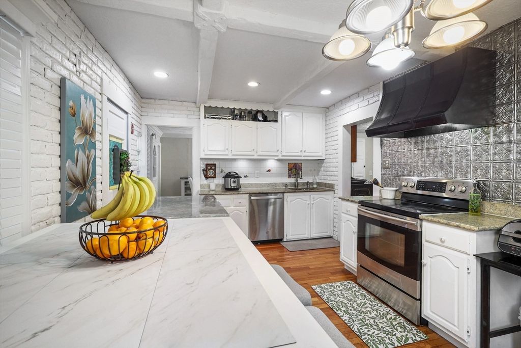 Interior, Kitchen, Recessed Lighting, Stainless Steel Appliances, Stone Walls, Wood Texture Flooring