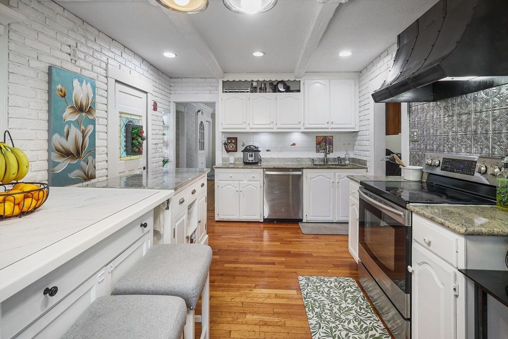 Interior, Kitchen, Recessed Lighting, Stainless Steel Appliances, Stone Walls, Wood Texture Flooring