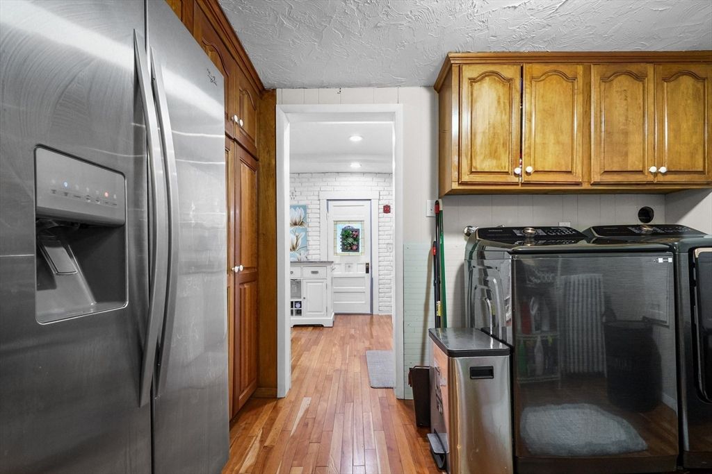 Interior, Kitchen, Recessed Lighting, Washer, Wood Texture Flooring