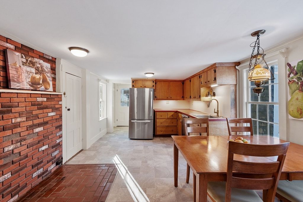 Dining room, Interior, Kitchen, Pendant Lights, Stainless Steel Appliances, Stone Walls