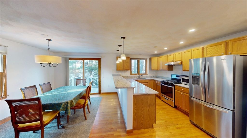Dining room, Interior, Kitchen, Pendant Lights, Recessed Lighting, Stainless Steel Appliances, Wood Texture Flooring