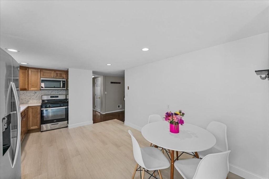 Dining room, Interior, Kitchen, Recessed Lighting, Stainless Steel Appliances, Wood Texture Flooring