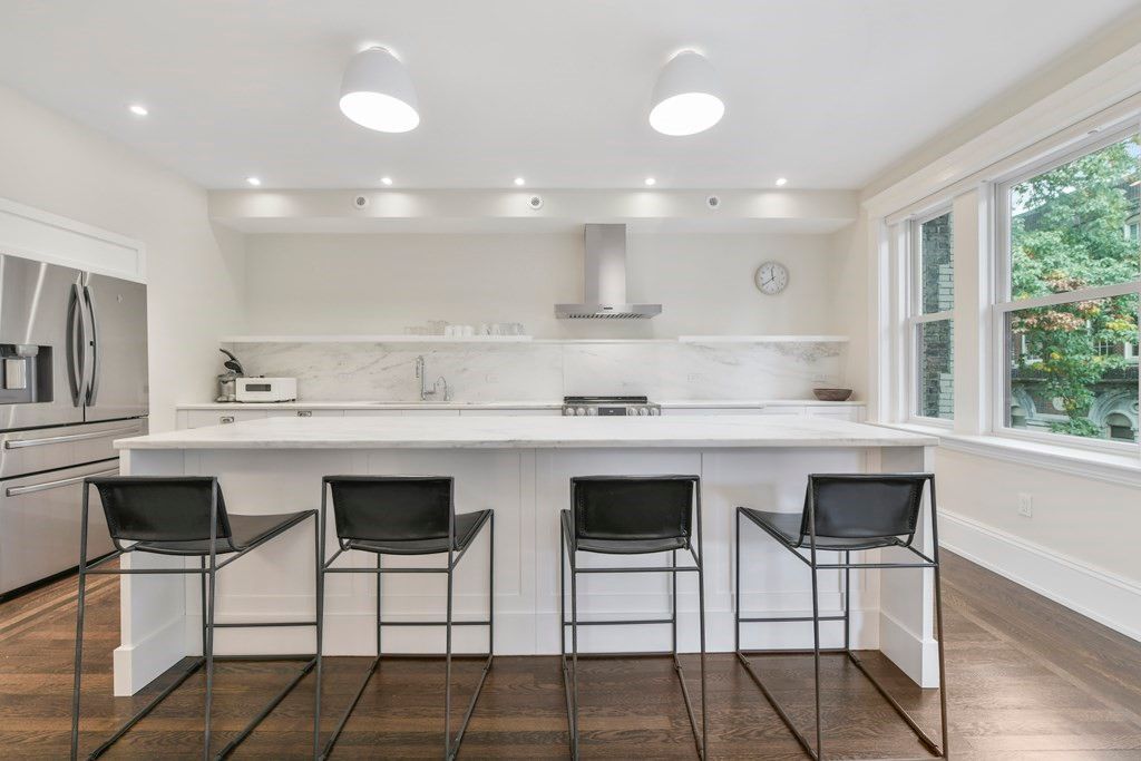 Interior, Kitchen, Marble Walls, Recessed Lighting, Stainless Steel Appliances, Wood Texture Flooring