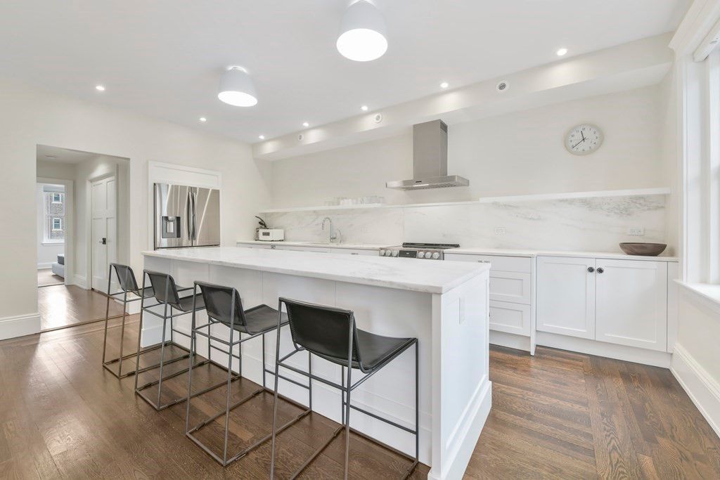 Interior, Kitchen, Marble Walls, Recessed Lighting, Stainless Steel Appliances, Wood Texture Flooring