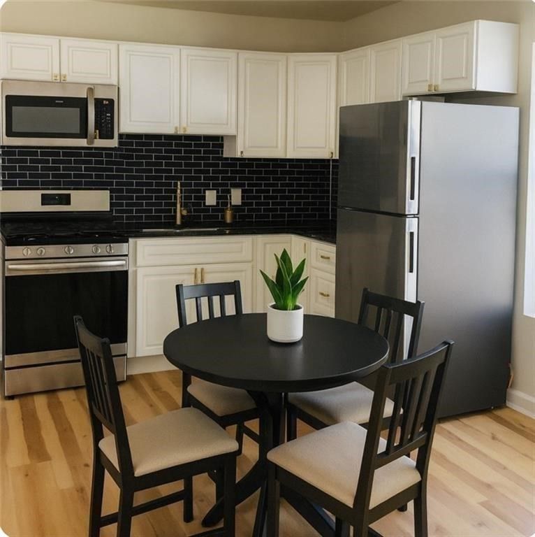 Dining room, Interior, Kitchen, Stainless Steel Appliances, Wood Texture Flooring