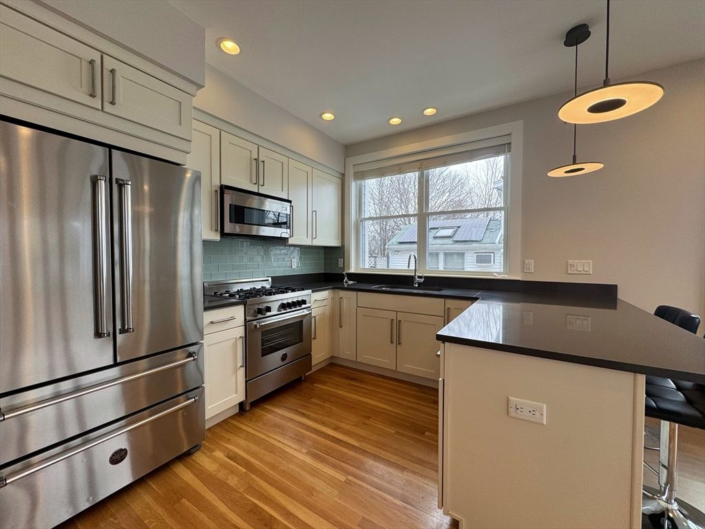 Interior, Kitchen, Pendant Lights, Recessed Lighting, Stainless Steel Appliances, Wood Texture Flooring