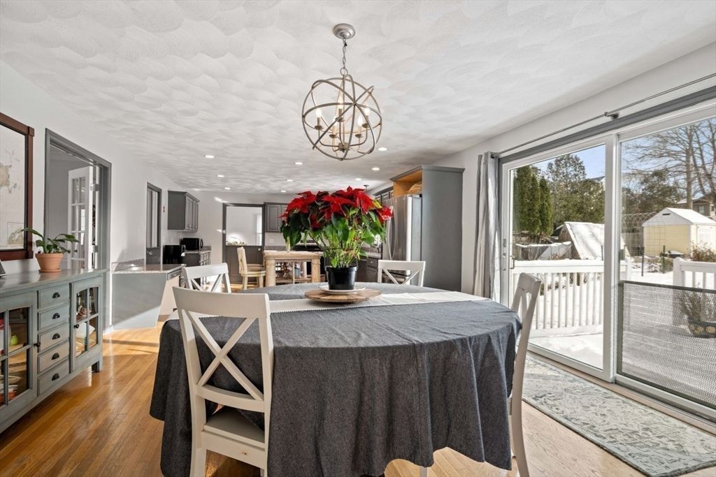 Chandelier, Dining room, Interior, Kitchen, Recessed Lighting, Stainless Steel Appliances, Wood Texture Flooring