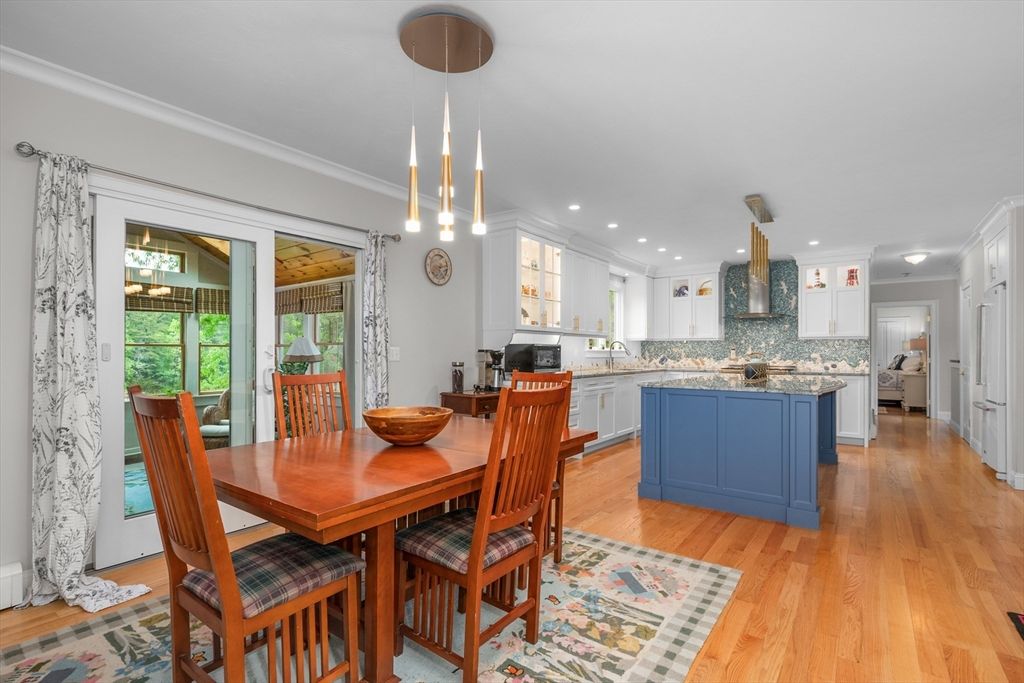 Dining room, Interior, Kitchen, Pendant Lights, Recessed Lighting, Stainless Steel Appliances, Wood Texture Flooring