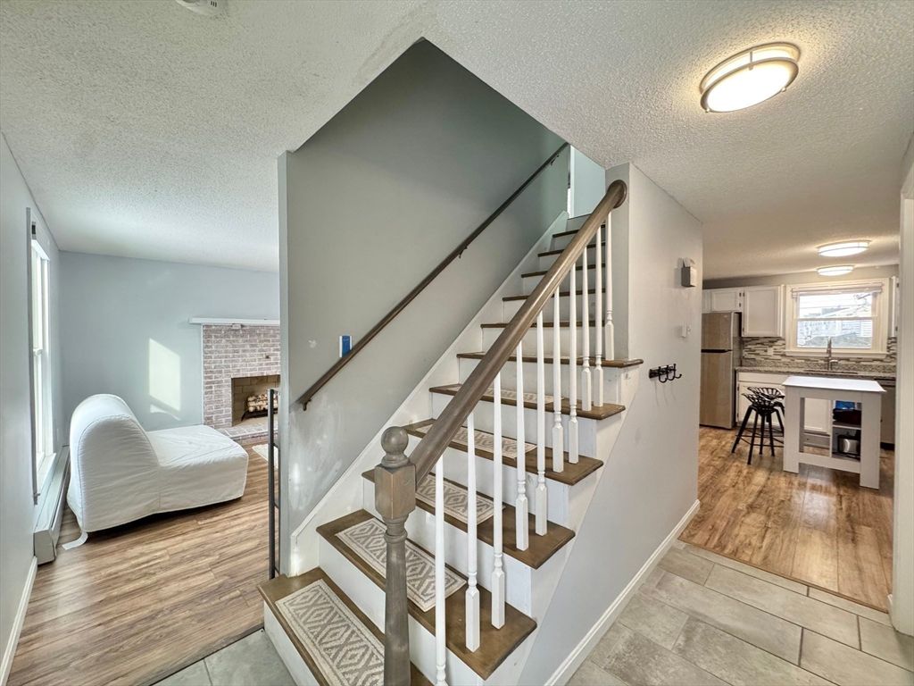 Dining room, Fireplace, Interior, Stone Walls, Wood Texture Flooring