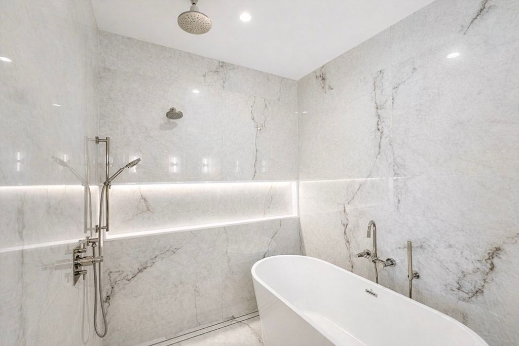 Bathroom, Free Standing Baths, Glass Shower, Interior, Marble Walls, Recessed Lighting