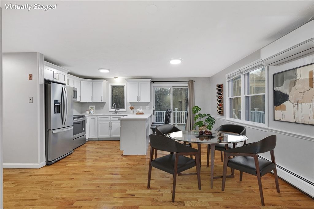 Dining room, Interior, Kitchen, Recessed Lighting, Stainless Steel Appliances, Wood Texture Flooring