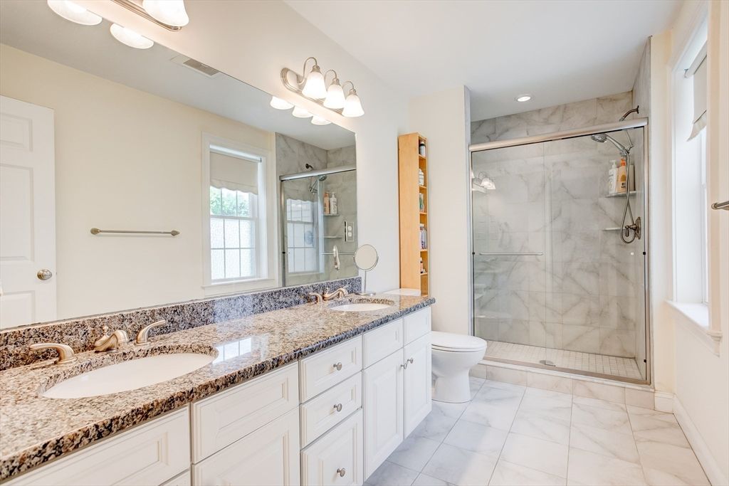 Bathroom, Dual Sink Vanities, Glass Shower, Interior, Marble, Marble Walls, Recessed Lighting