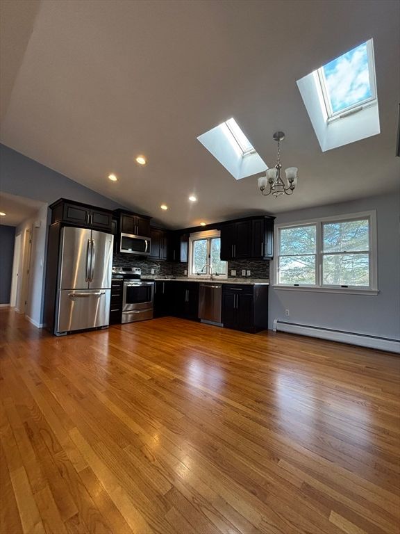 Chandelier, Interior, Kitchen, Recessed Lighting, Stainless Steel Appliances, Wood Texture Flooring