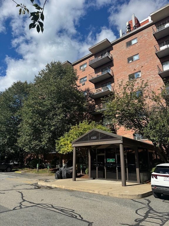 Exterior, Facade, Brick Facade, Condo Building