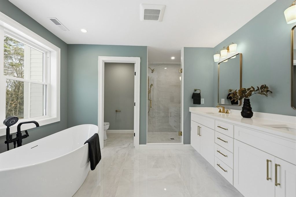 Bathroom, Dual Sink Vanities, Free Standing Baths, Glass Shower, Interior, Marble, Marble Walls, Recessed Lighting