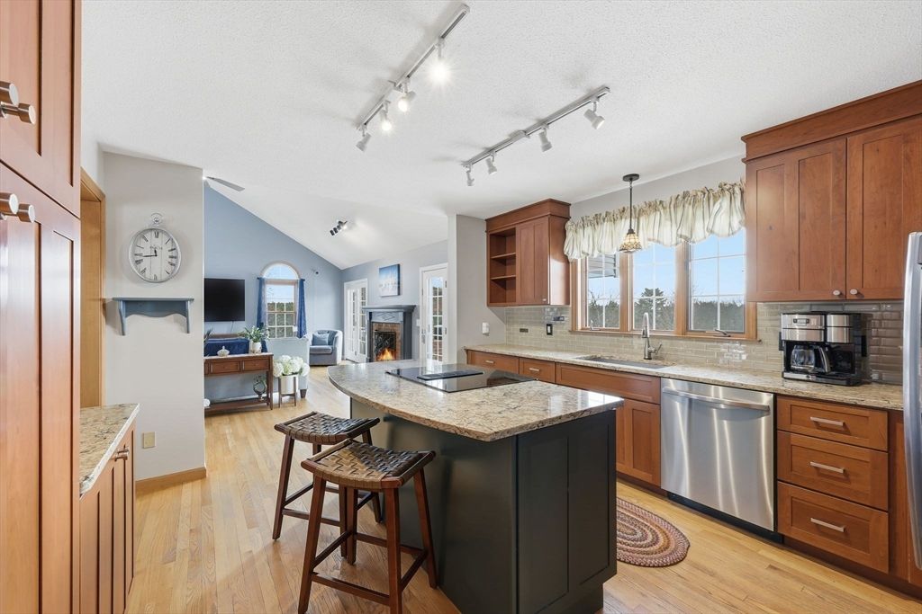 Fireplace, Interior, Kitchen, Pendant Lights, Stainless Steel Appliances, Wood Texture Flooring