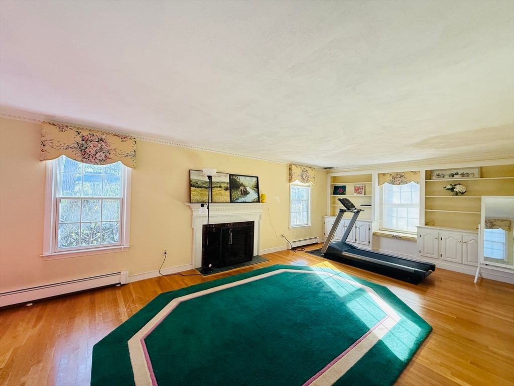 Fireplace, Fitness Equipment, Interior, Wood Texture Flooring