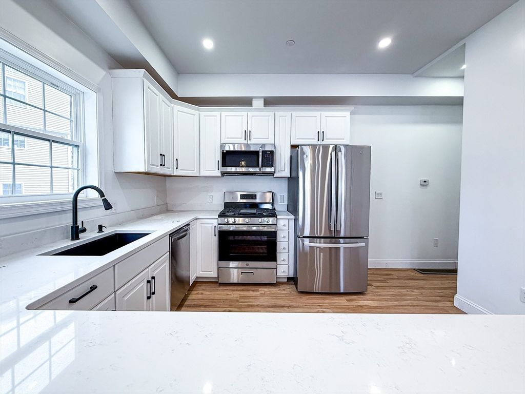 Interior, Kitchen, Recessed Lighting, Stainless Steel Appliances, Wood Texture Flooring