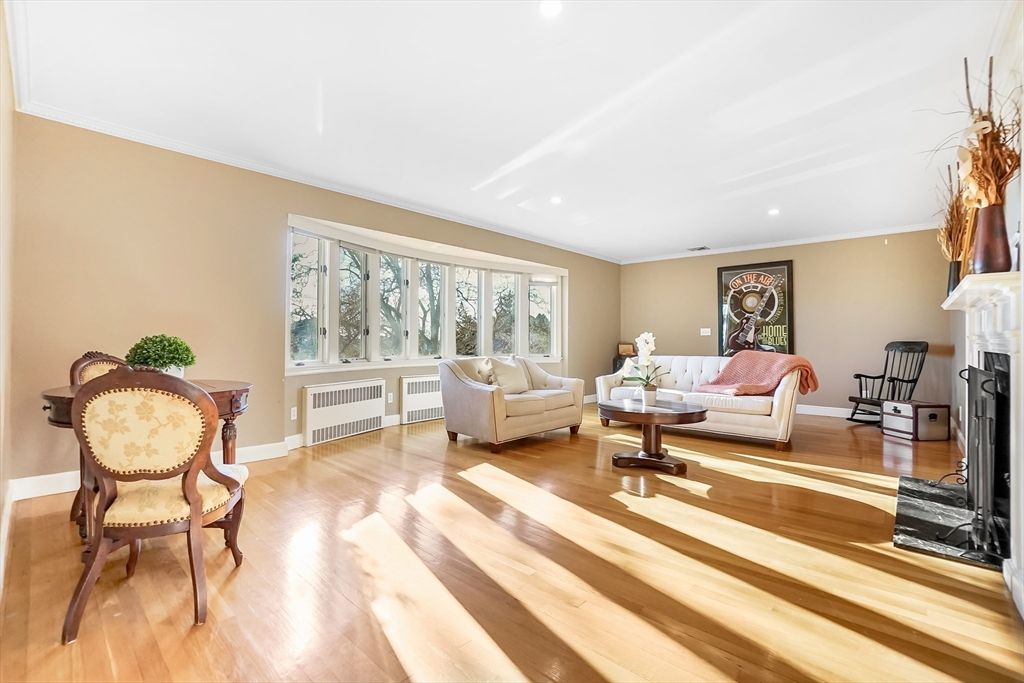 Dining room, Fireplace, Interior, Living room, Recessed Lighting, Wood Texture Flooring