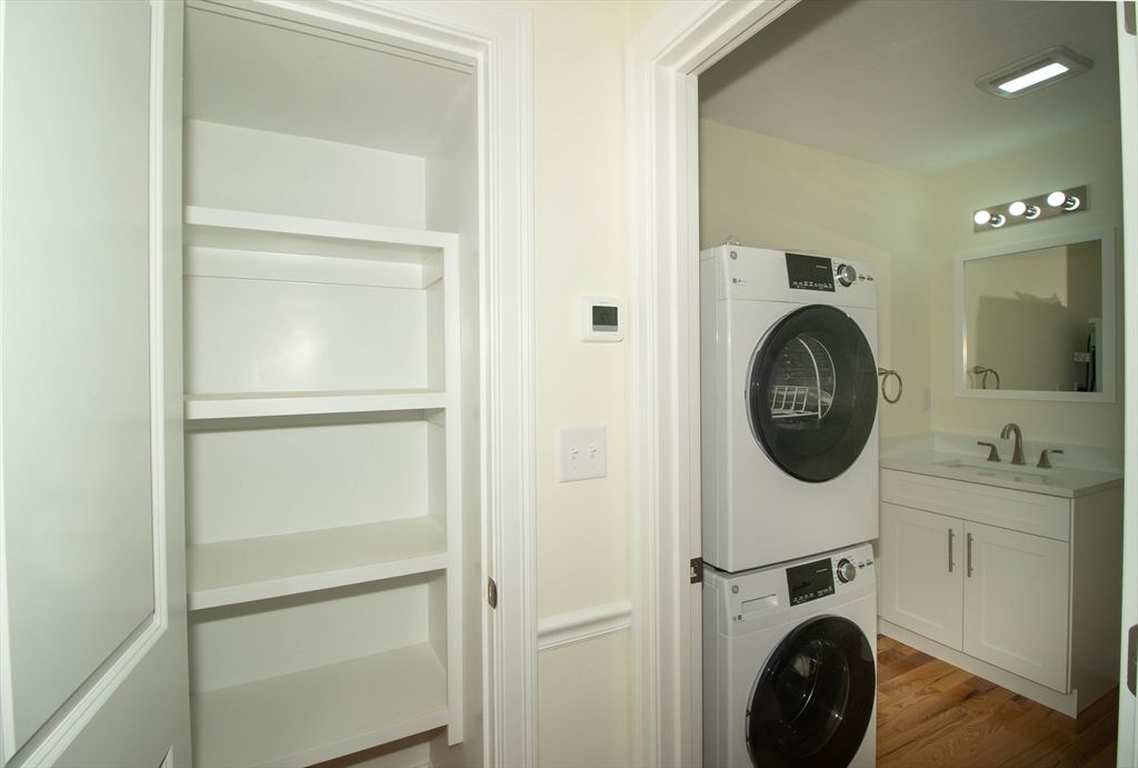 Bathroom, Interior, Recessed Lighting, Utility Closets, Washer, Wood Texture Flooring