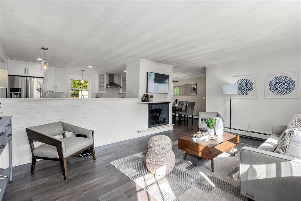 Dining room, Fireplace, Interior, Kitchen, Living room, Pendant Lights, Recessed Lighting, Stainless Steel Appliances, Wood Texture Flooring