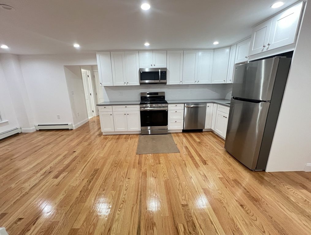 Interior, Kitchen, Recessed Lighting, Stainless Steel Appliances, Wood Texture Flooring