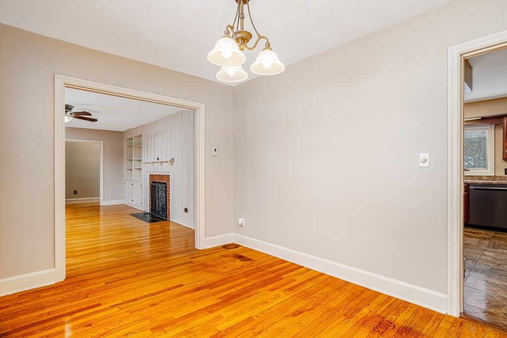 Empty room, Fireplace, Interior, Pendant Lights, Wood Texture Flooring