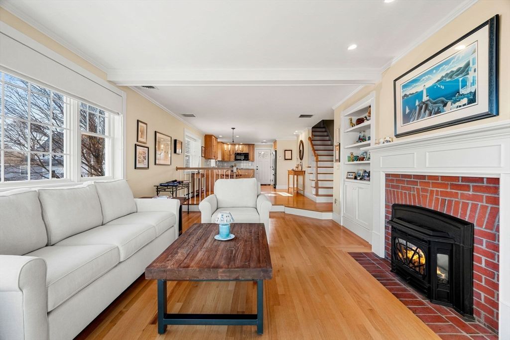 Chandelier, Dining room, Fireplace, Interior, Living room, Pendant Lights, Recessed Lighting, Stone Walls, Wood Texture Flooring