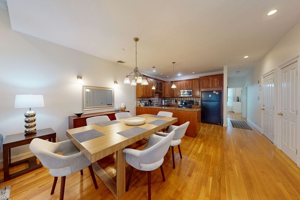 Dining room, Interior, Kitchen, Pendant Lights, Recessed Lighting, Stainless Steel Appliances, Wood Texture Flooring