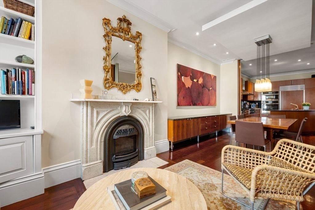 Dining room, Fireplace, Interior, Kitchen, Pendant Lights, Recessed Lighting, Stainless Steel Appliances, Wood Texture Flooring