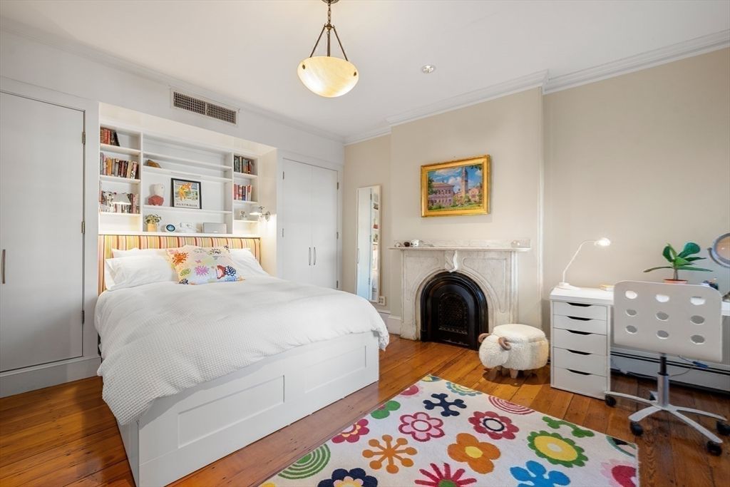 Bedroom, Fireplace, Interior, Pendant Lights, Recessed Lighting, Wood Texture Flooring