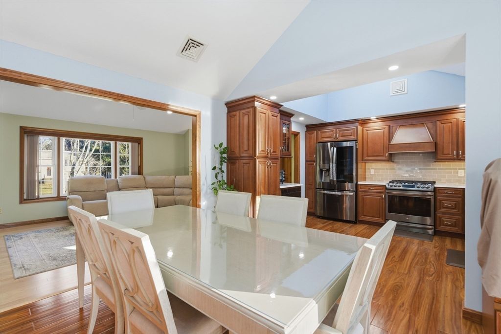 Dining room, Interior, Kitchen, Living room, Recessed Lighting, Stainless Steel Appliances, Wood Texture Flooring