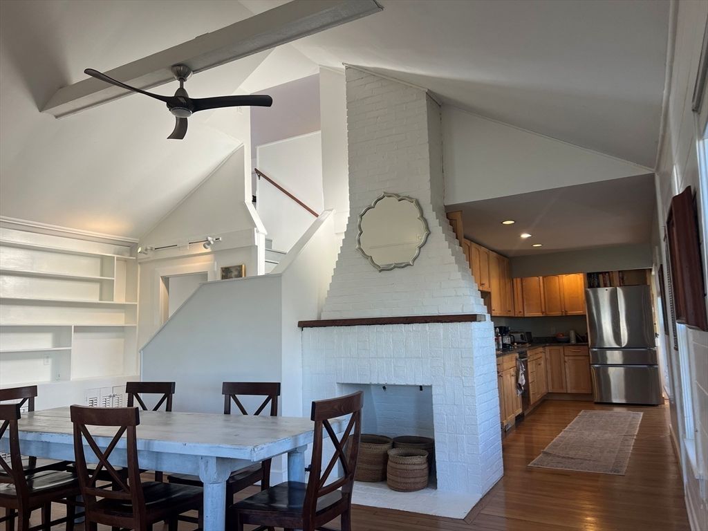 Dining room, Fireplace, Interior, Kitchen, Recessed Lighting, Wood Texture Flooring