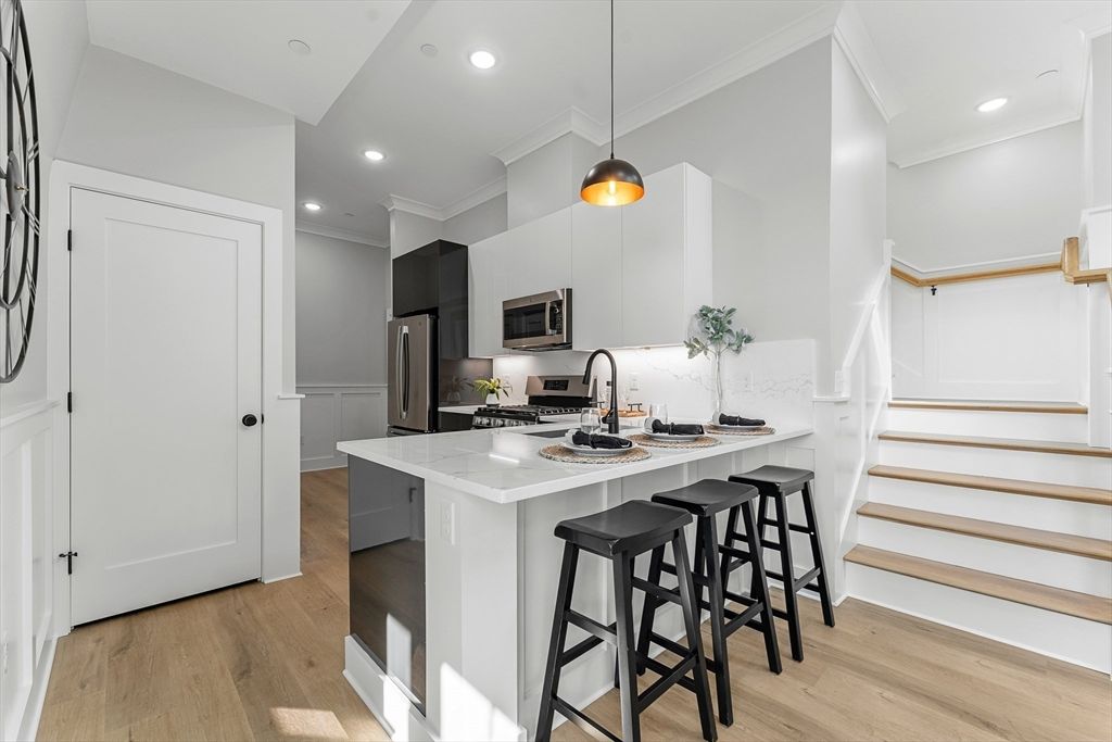 Interior, Kitchen, Pendant Lights, Recessed Lighting, Stainless Steel Appliances, Wood Texture Flooring