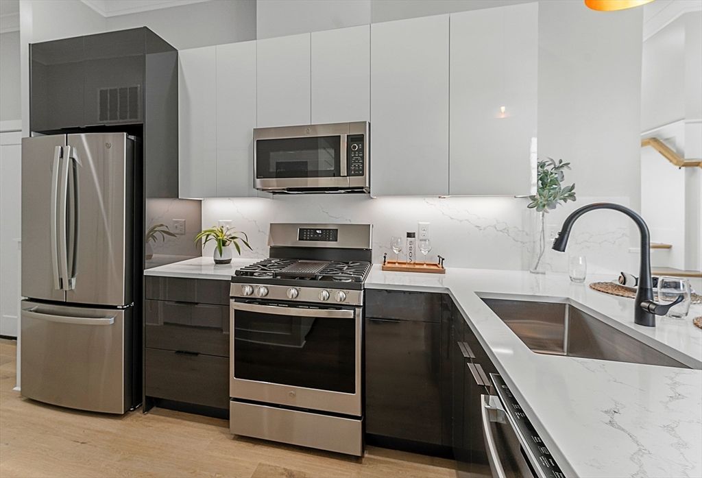 Interior, Kitchen, Marble Walls, Stainless Steel Appliances, Wood Texture Flooring