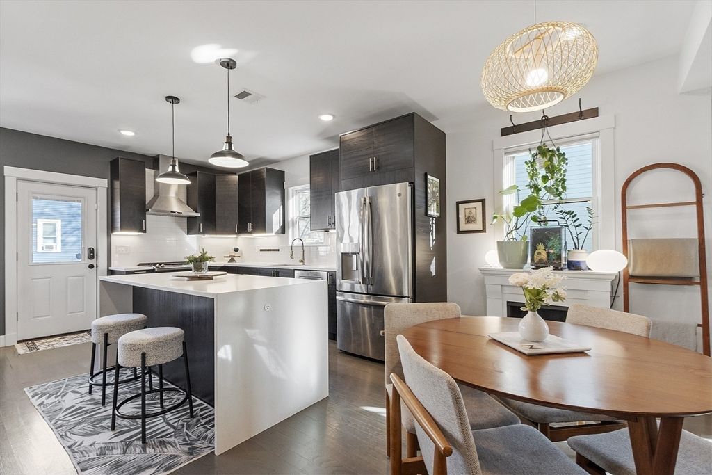 Dining room, Interior, Kitchen, Pendant Lights, Recessed Lighting, Stainless Steel Appliances, Wood Texture Flooring