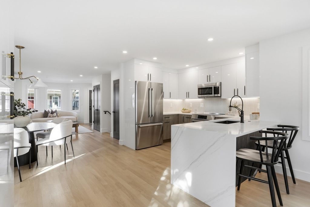 Dining room, Interior, Kitchen, Pendant Lights, Recessed Lighting, Stainless Steel Appliances, Wood Texture Flooring