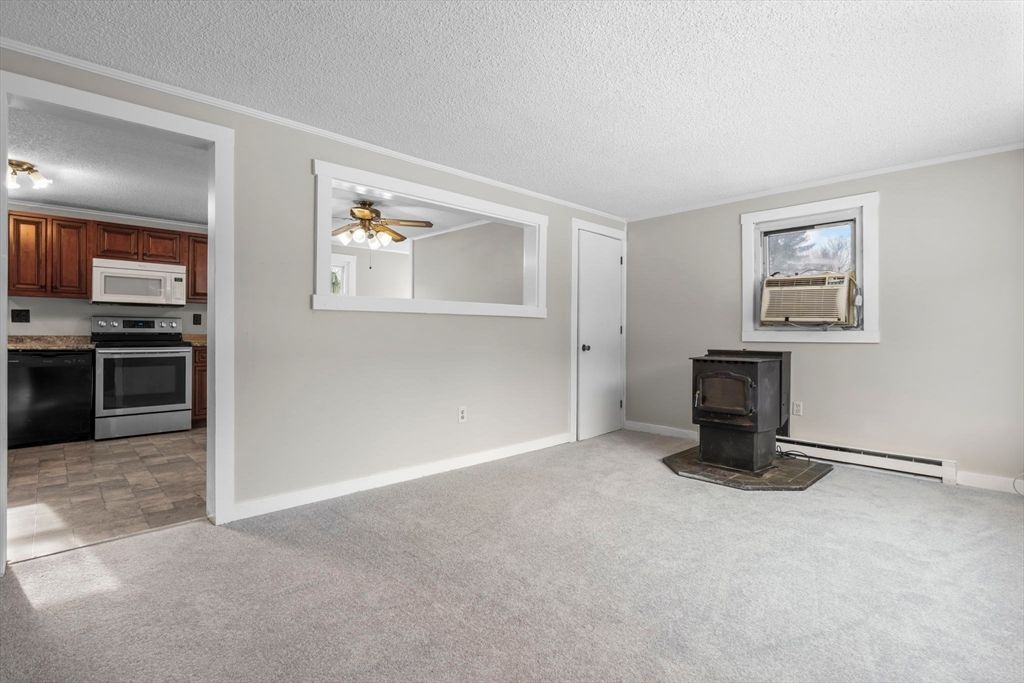 Empty room, Fireplace, Interior, Kitchen, Stainless Steel Appliances