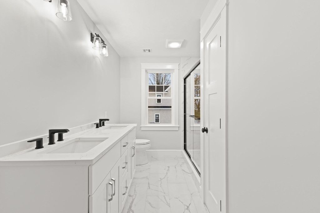 Bathroom, Dual Sink Vanities, Glass Shower, Interior, Marble, Recessed Lighting