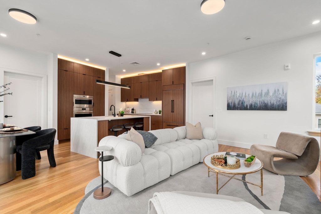 Dining room, Interior, Kitchen, Living room, Pendant Lights, Recessed Lighting, Stainless Steel Appliances, Wood Texture Flooring