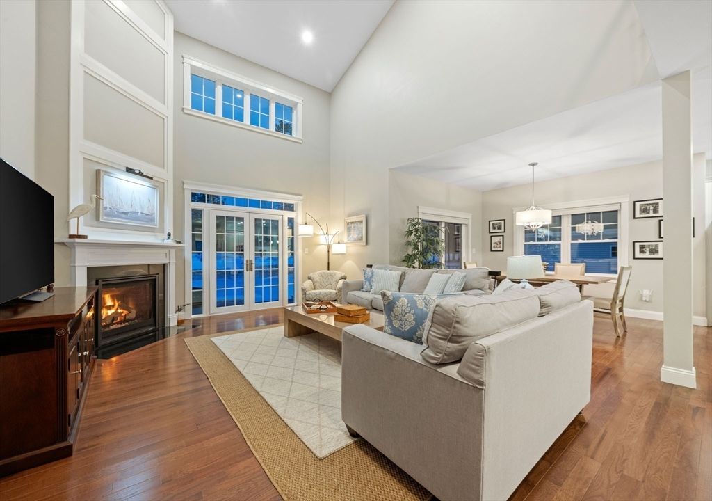 Dining room, Fireplace, Interior, Living room, Pendant Lights, Recessed Lighting, Wood Texture Flooring