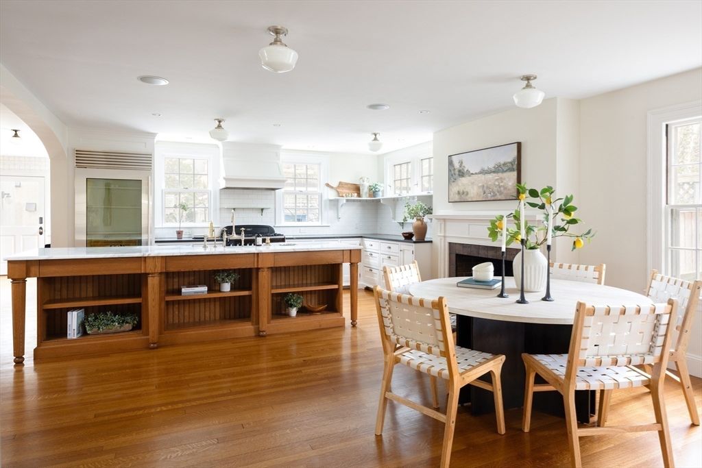 Dining room, Fireplace, Interior, Kitchen, Recessed Lighting, Wood Texture Flooring