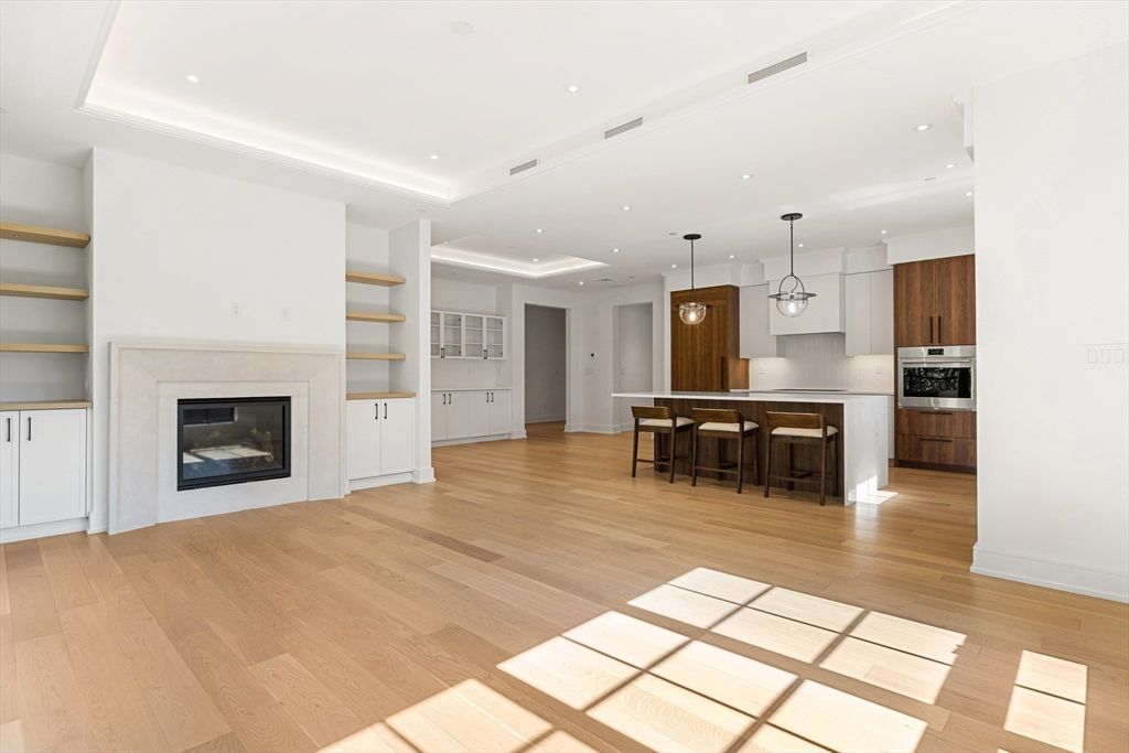 Fireplace, Interior, Kitchen, Pendant Lights, Recessed Lighting, Stainless Steel Appliances, Wood Texture Flooring